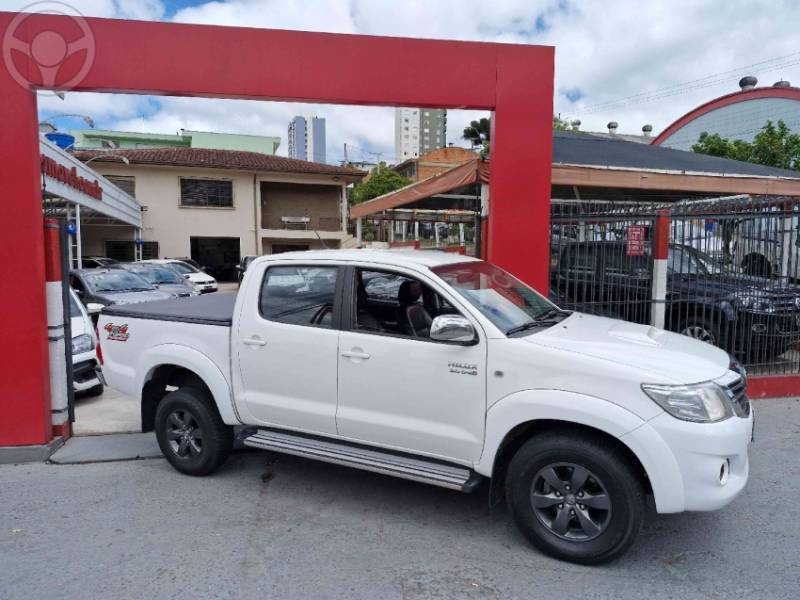 TOYOTA - HILUX 3.0 SR 4X4 CD 16V TURBO INTERCOOLER DIESEL 4P AUTOMÁTICO - 2014/2015 - BRANCA - R$ 142.000,00