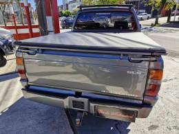 MITSUBISHI - L200 2.5 GLS HPE 4X4 CD 8V TURBO DIESEL 4P MANUAL - 2002/2003 - CINZA - R$ 59.000,00