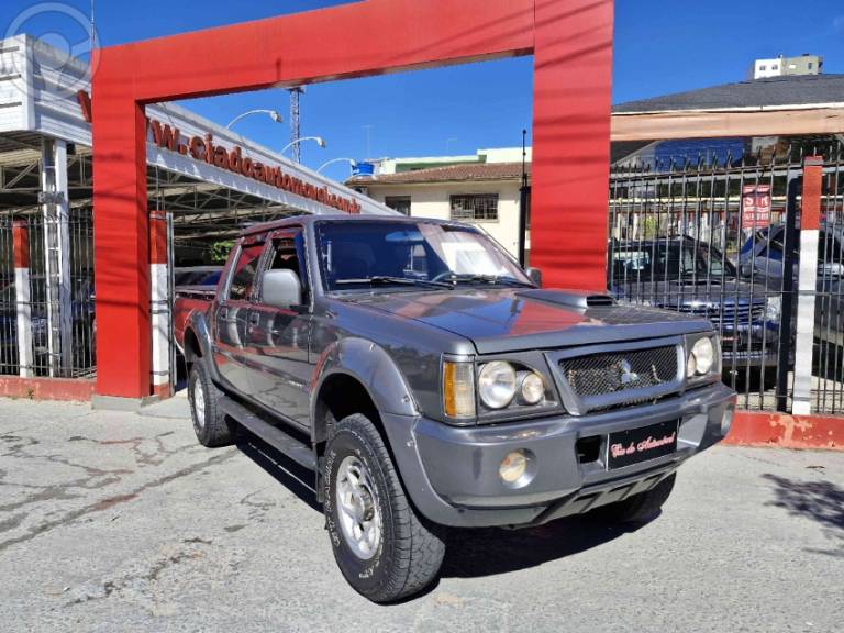 MITSUBISHI - L200 2.5 GLS HPE 4X4 CD 8V TURBO DIESEL 4P MANUAL - 2002/2003 - CINZA - R$ 59.000,00
