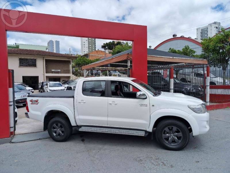 TOYOTA - HILUX 3.0 SR 4X4 CD 16V TURBO INTERCOOLER DIESEL 4P AUTOMÁTICO - 2014/2015 - BRANCA - R$ 142.000,00