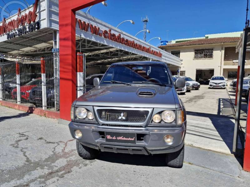 MITSUBISHI - L200 2.5 GLS HPE 4X4 CD 8V TURBO DIESEL 4P MANUAL - 2002/2003 - CINZA - R$ 59.000,00